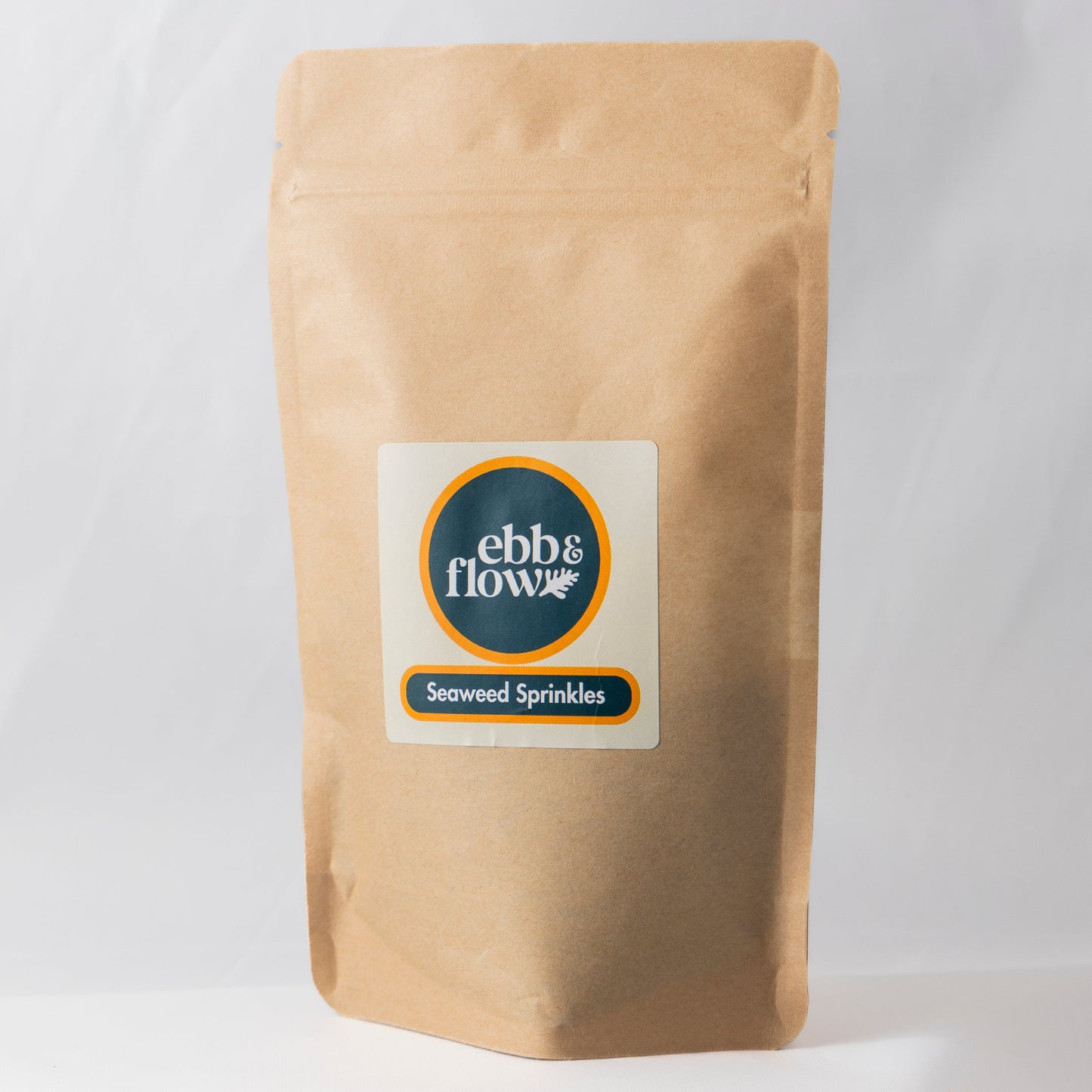 Large bag of wild Irish seaweed sprinkles on a white background