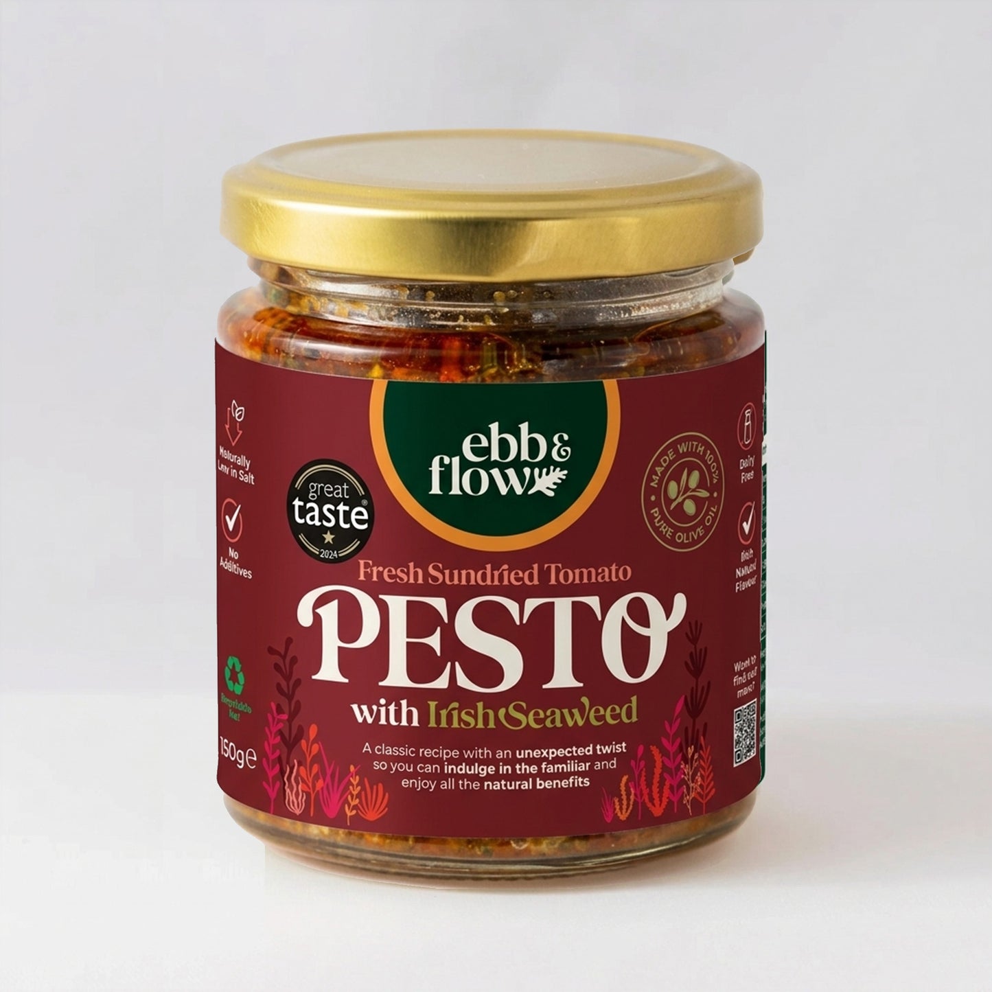Jar of Fresh Sundried Tomato Red Pesto with Irish seaweed with a gold lid on a white background