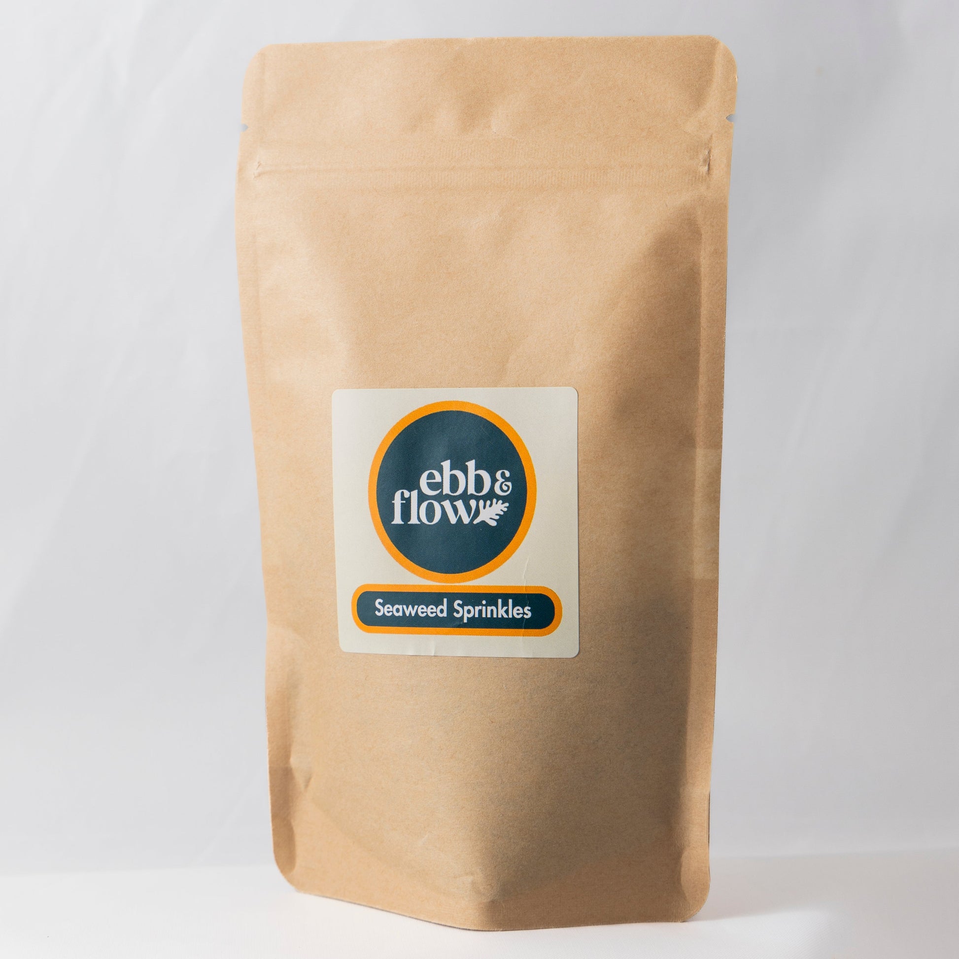 Large bag of wild Irish seaweed sprinkles on a white background