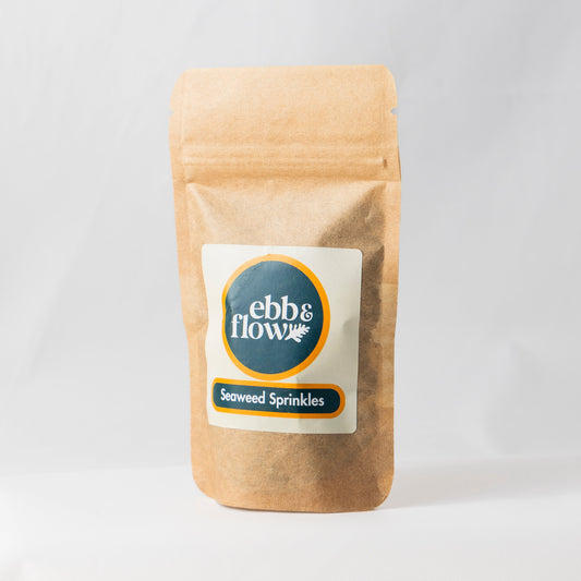 Bag of wild Irish seaweed sprinkles on a white background